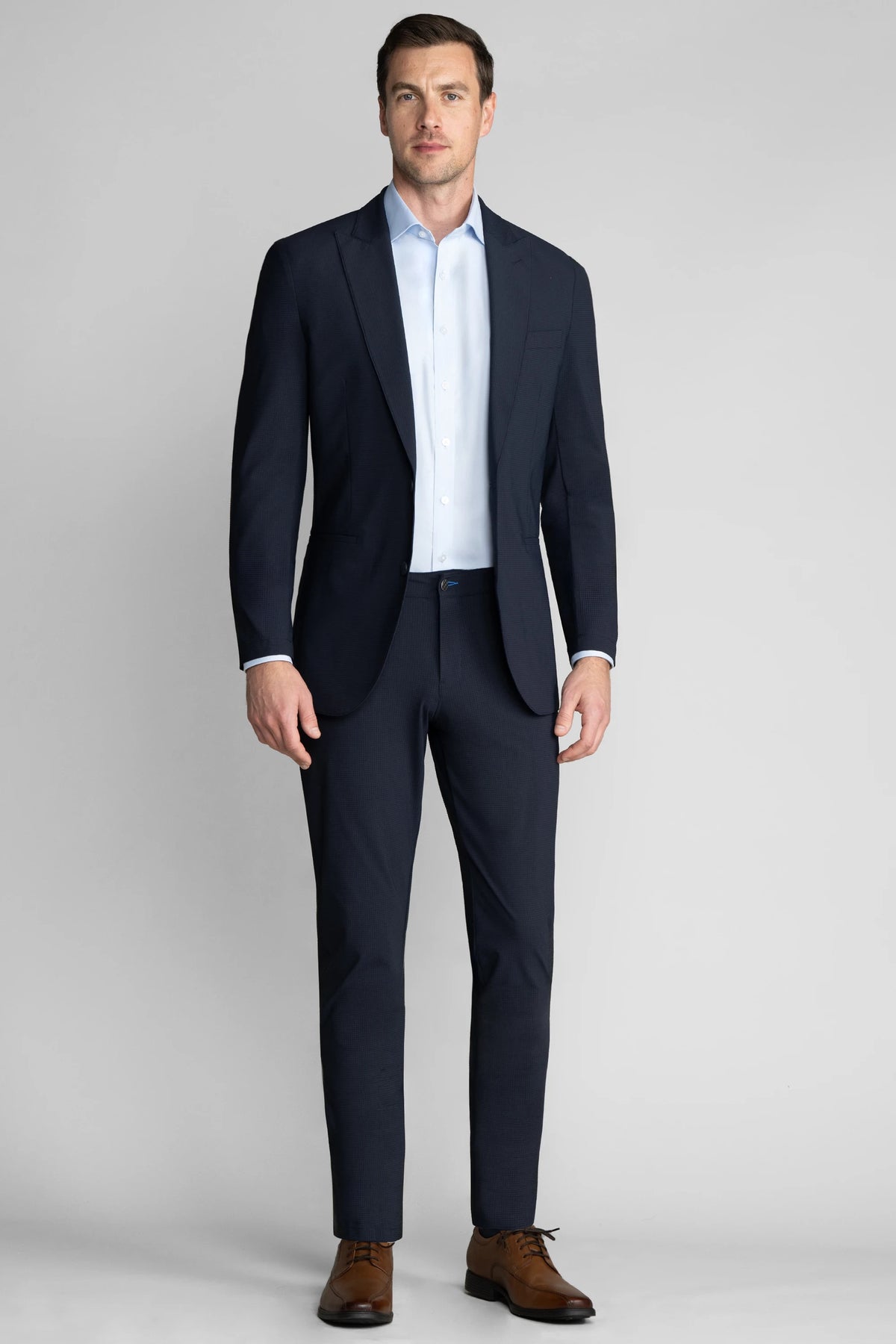 Full-length view of model wearing Gravity Blazer – Navy for overall fit.
