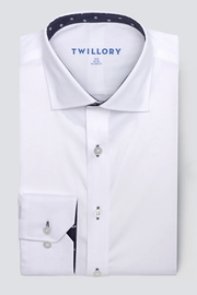 A neatly folded Twillory Leader Contrast // Navy Skull Performance Shirt with a classic collar. The inner collar and cuffs feature navy skull print. Made with 4-way stretch fabric, white buttons, and "Twillory" printed in blue inside the collar.