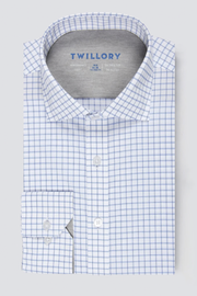 The Twillory Leader Windowpane // Blue is a neatly folded, long-sleeve performance shirt with a white base and blue grid pattern, classic collar, 4-way stretch, white buttons, and an inner “Twillory” brand label.