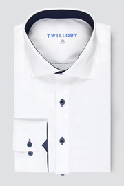 The Twillory Leader Contrast // Navy shirt features crisp white fabric, navy buttons and stitching, a navy-lined collar and placket, plus “TWILLORY” printed in blue on a light gray background inside the collar.