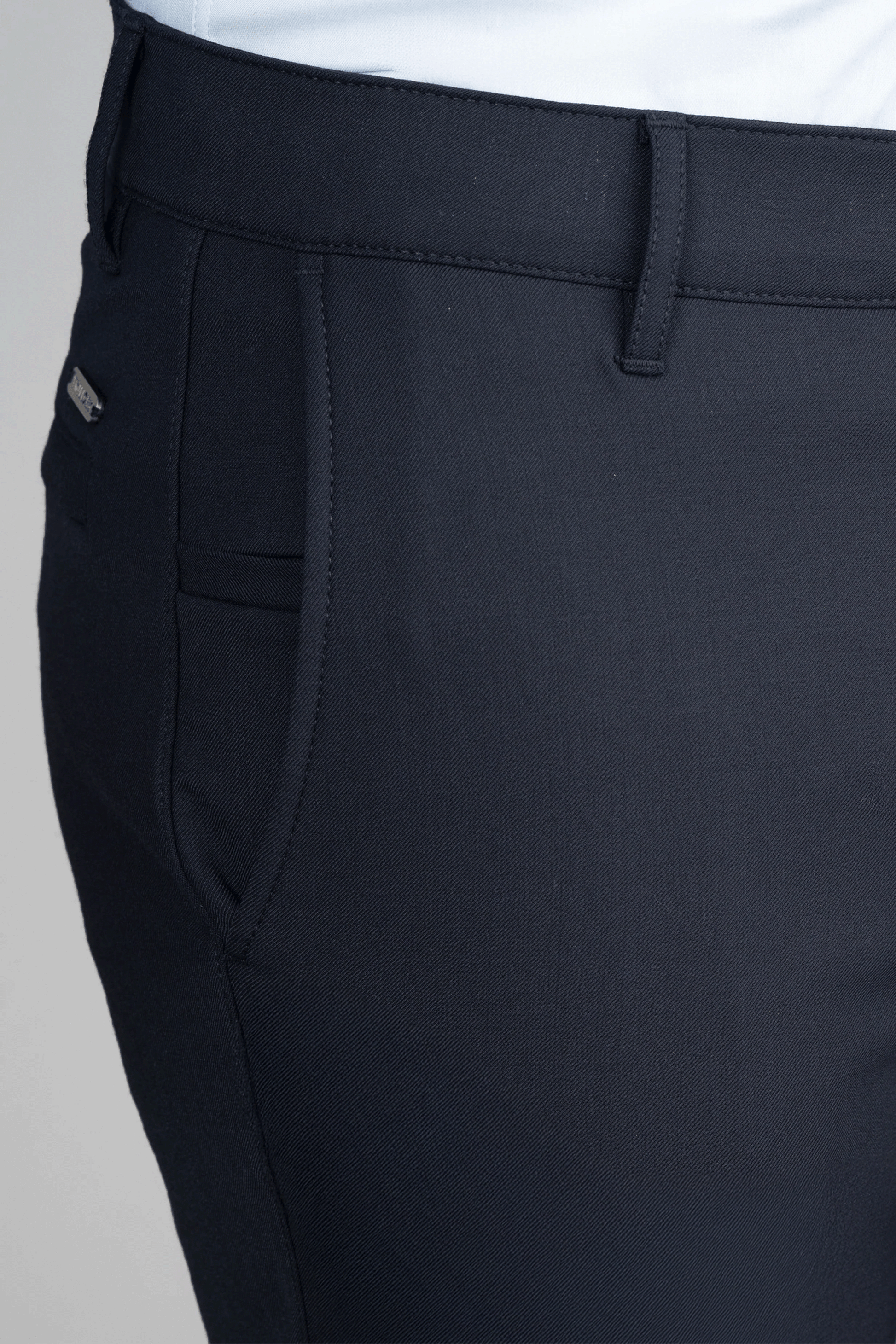 A close-up of Twillory's Hybrid Wool Pants in navy, combining sleek style with exceptional comfort.