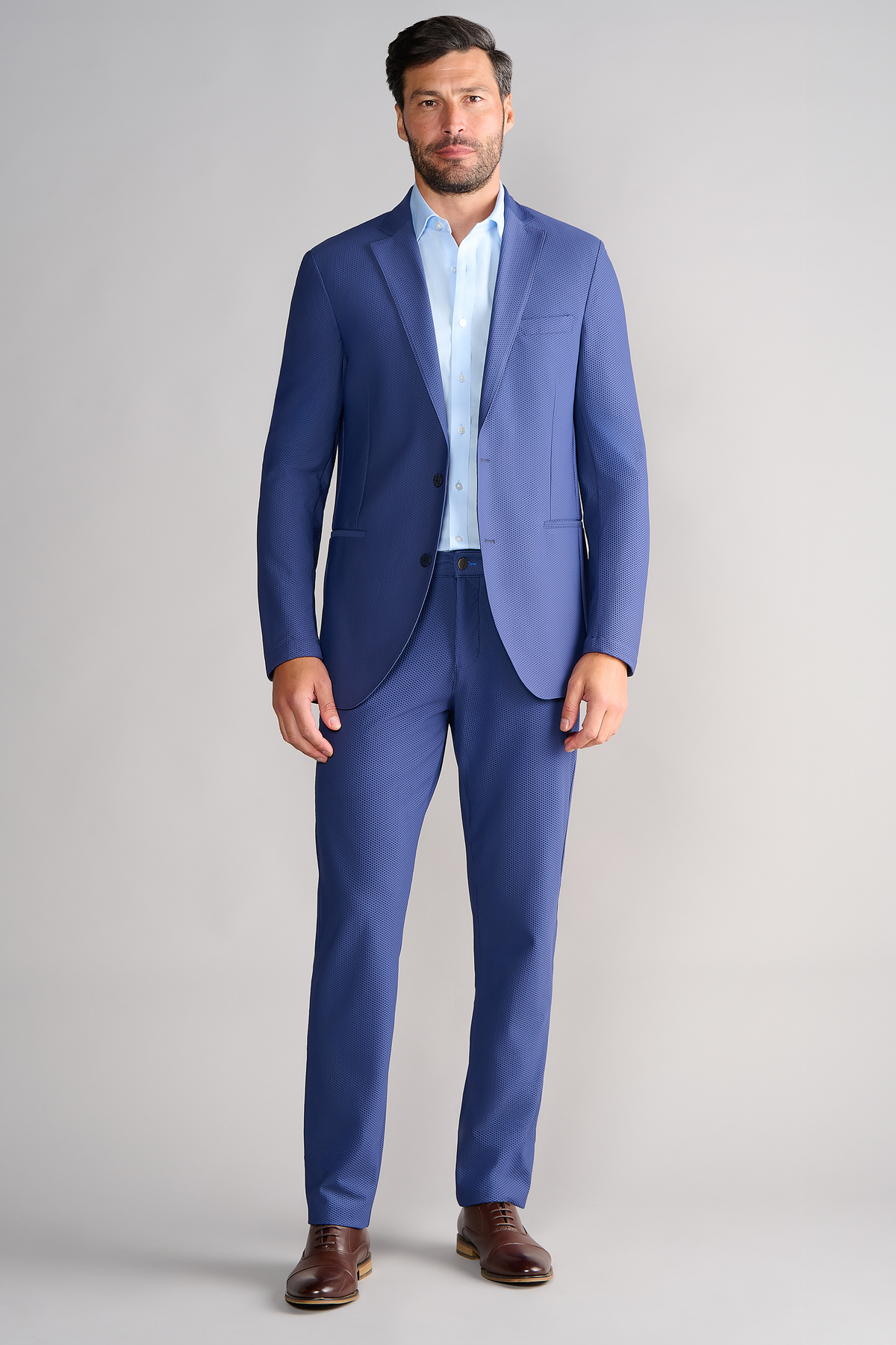 Full-length view of model wearing AIR Blazer – Blue facing forward for overall fit.