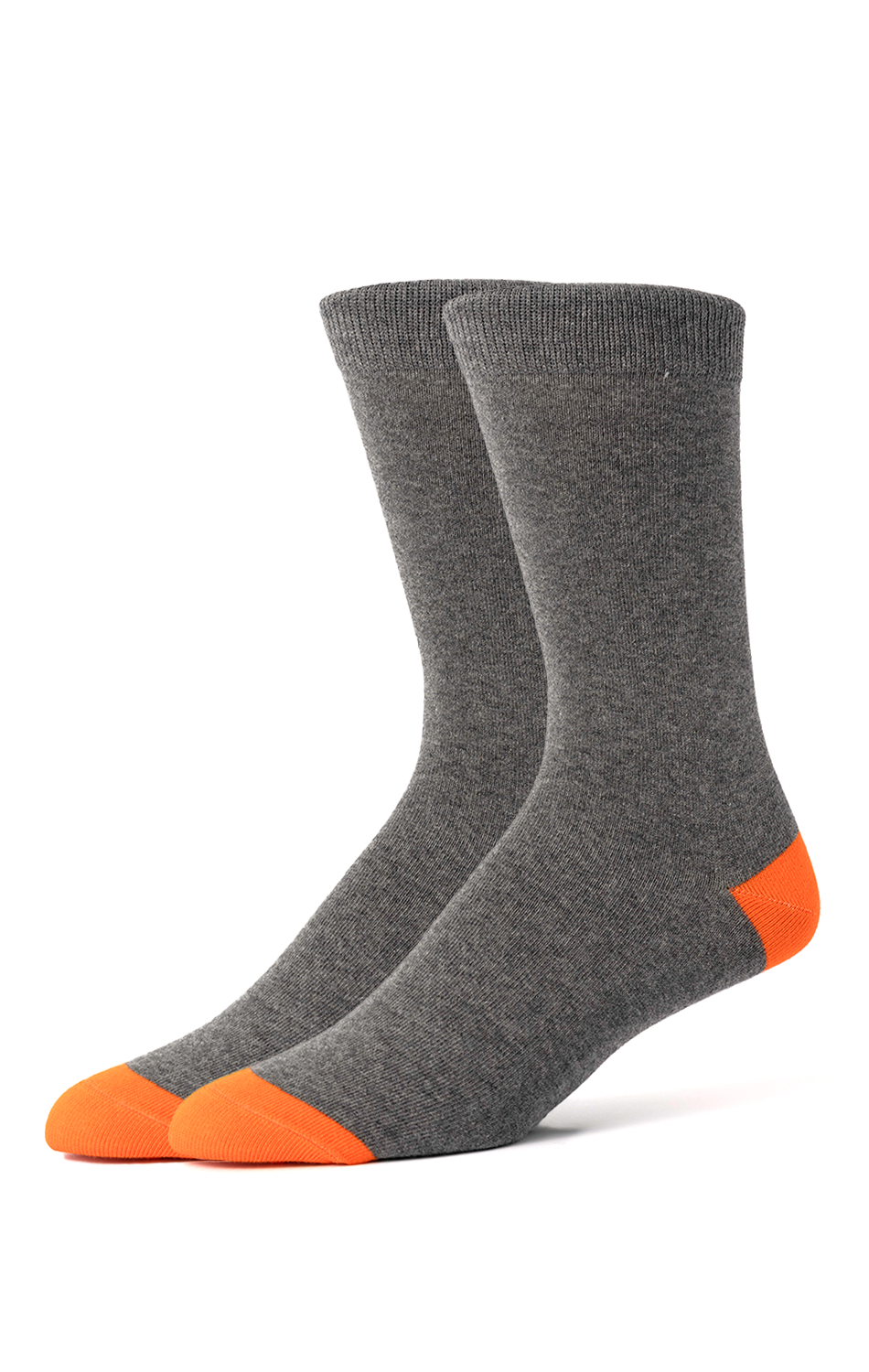 Twillory’s Charcoal…And Orange crew socks stand upright and lean slightly left, showcasing bright orange toes and heels, ribbed cuffs, and a simple design—all on a white background.